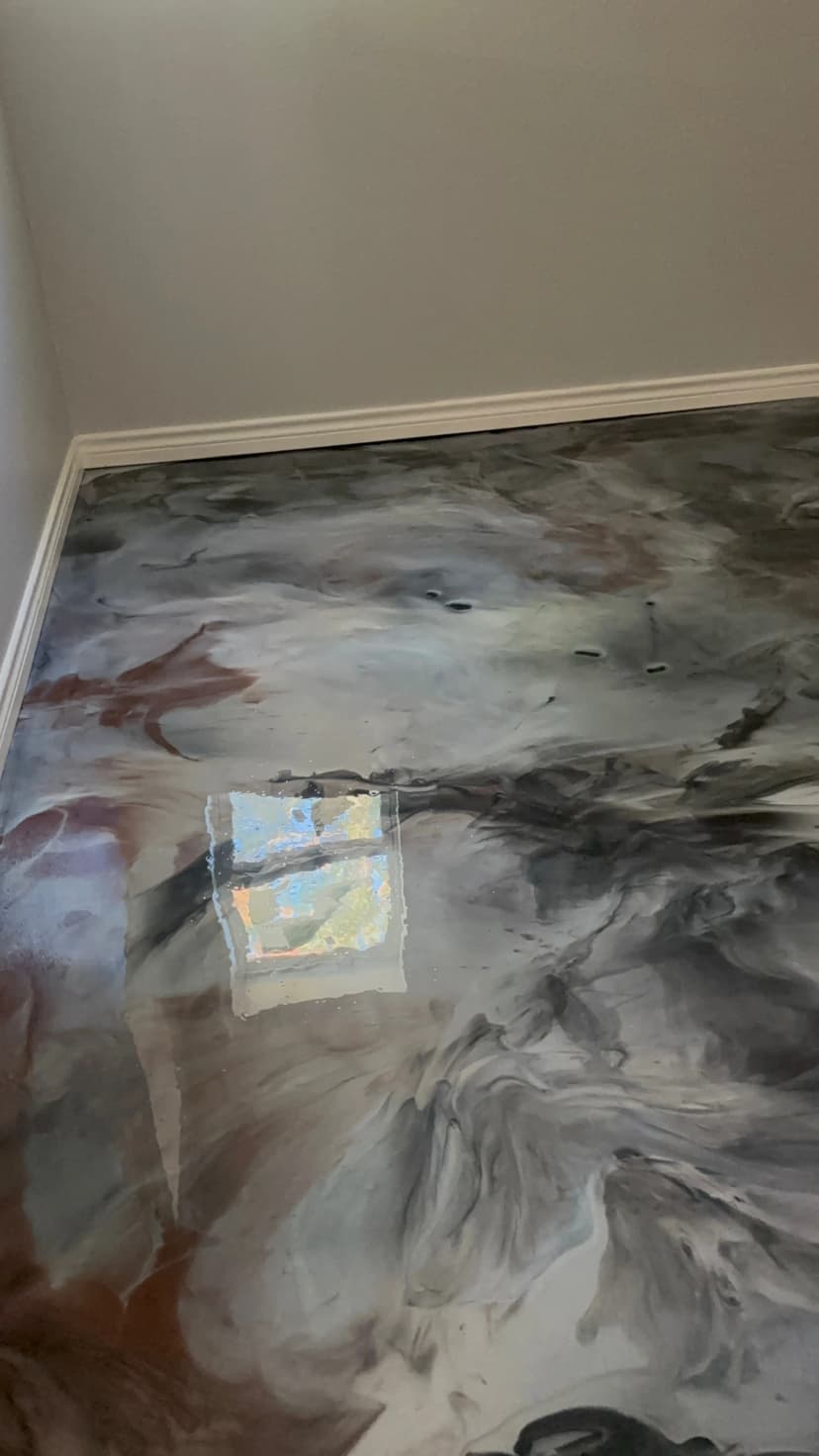 Residential Metallic Epoxy Floor With Brown Tones
